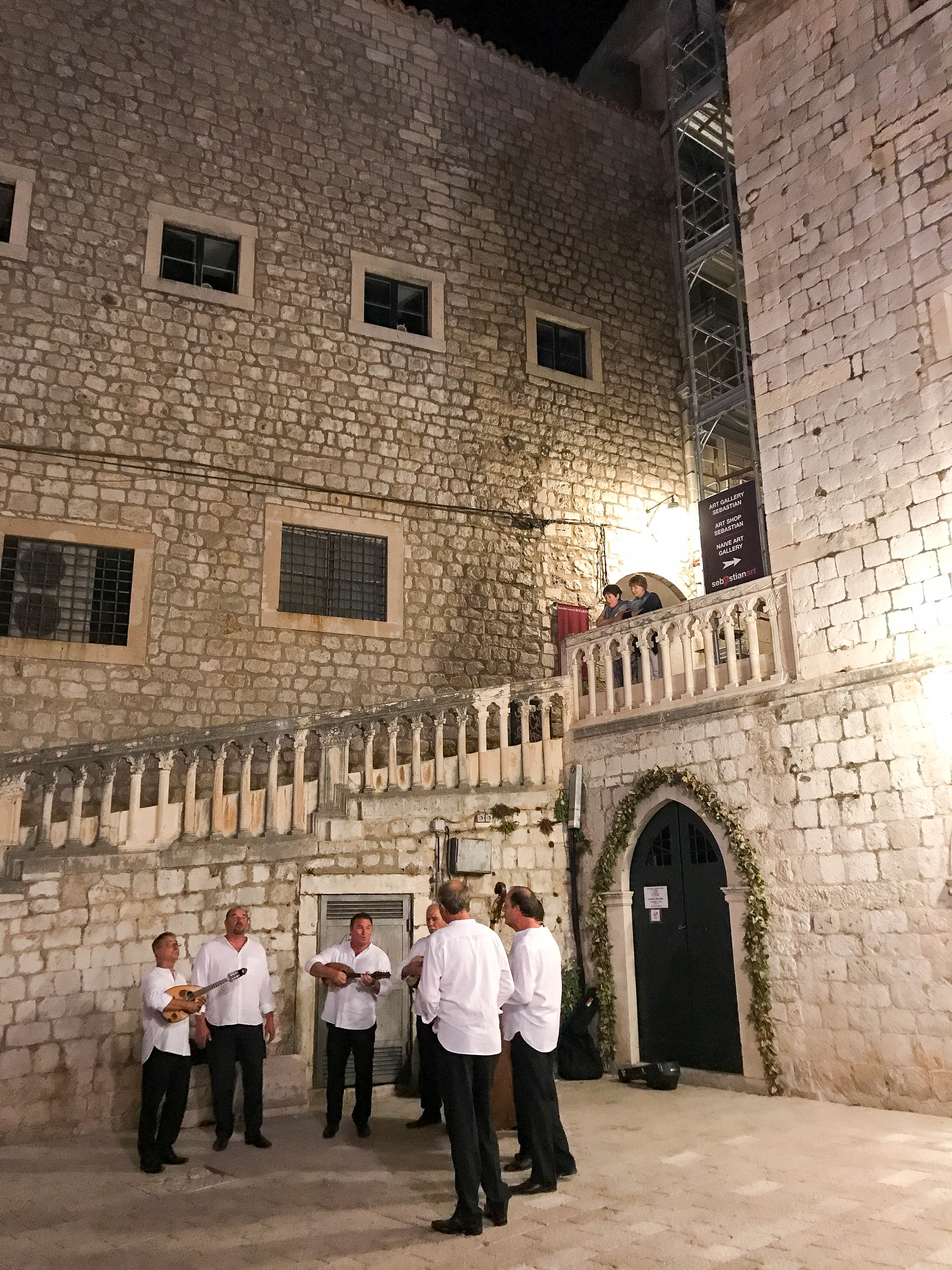 Singers perform on the eastern end of the Old City near Ploče gate.