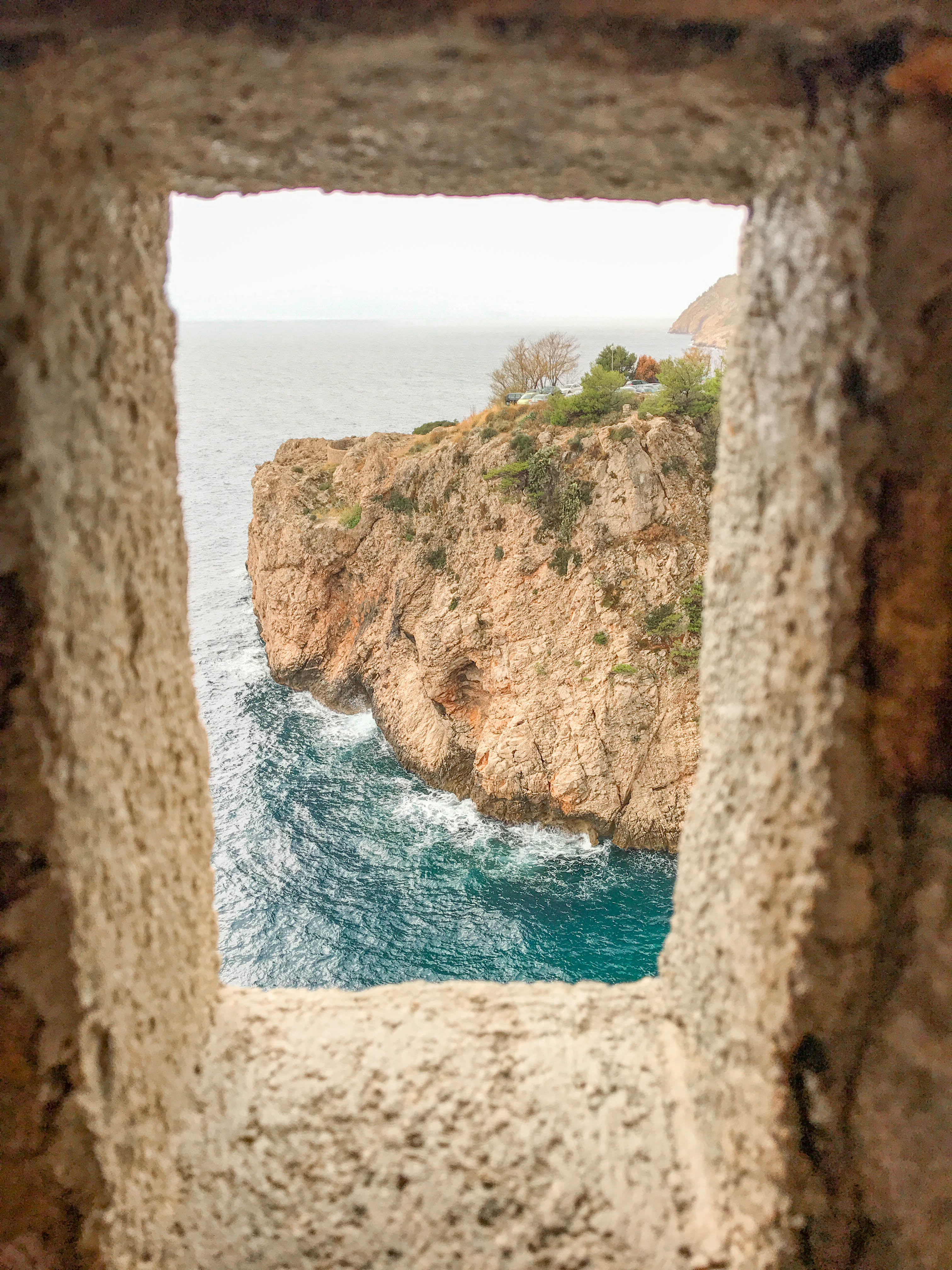 Peeping out a fort window on the opposite side to the Old City.