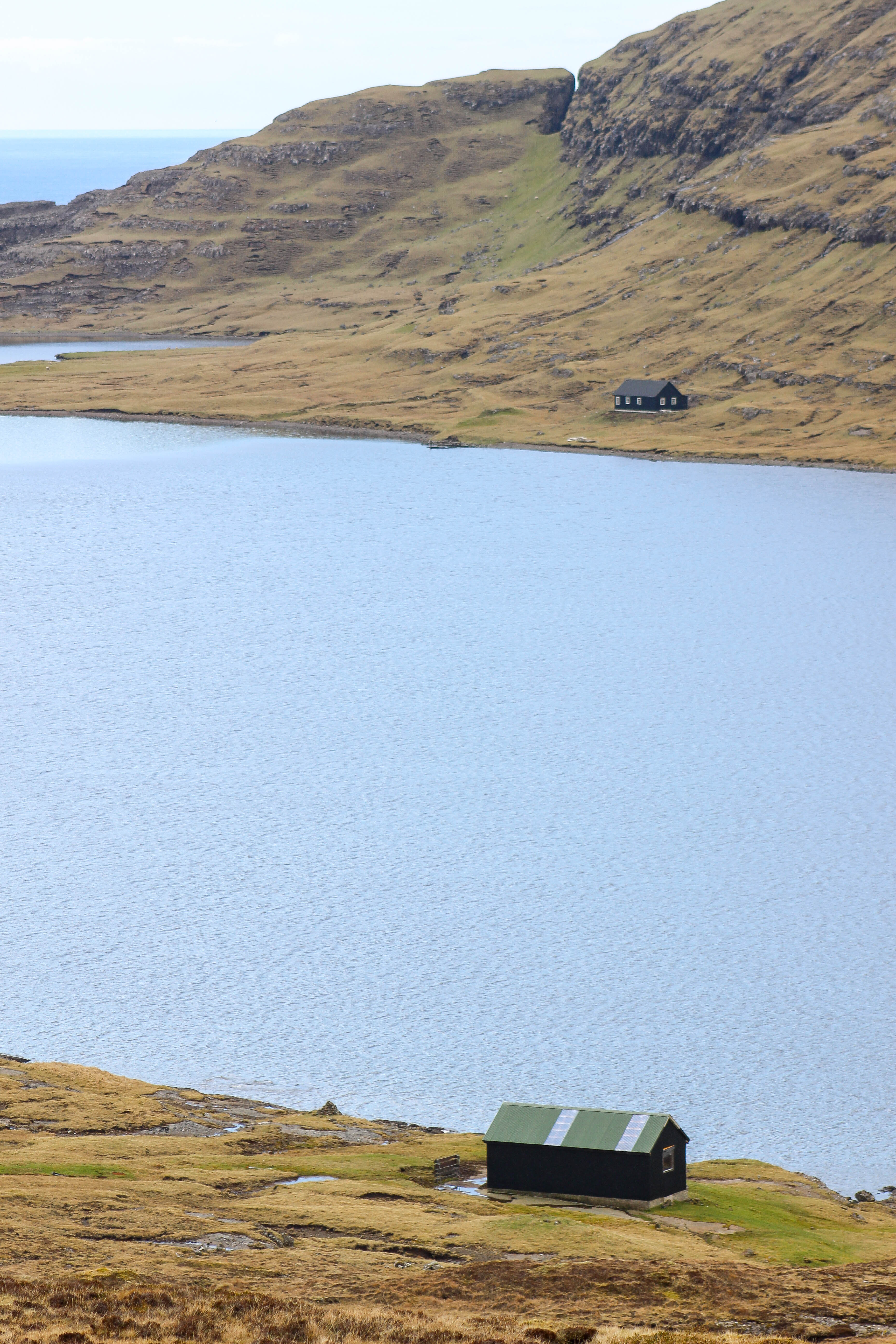 The Lake Sørvágsvatn hike out to Trælanípa cliffs and Bøsdalafossur waterfall | Faroe Islands | CompassAndTwine.com