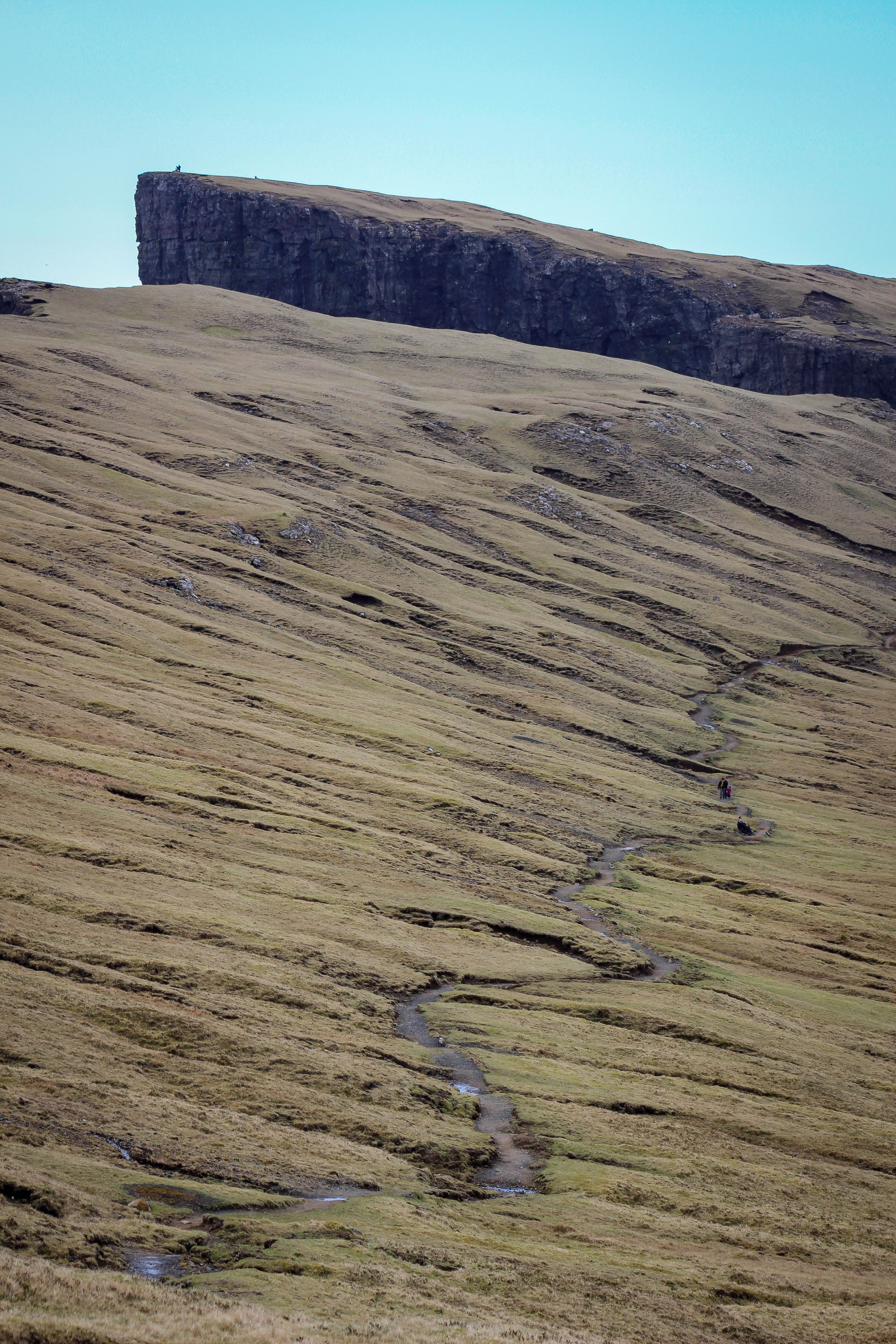 The Lake Sørvágsvatn hike out to Trælanípa cliffs and Bøsdalafossur waterfall | Faroe Islands | CompassAndTwine.com