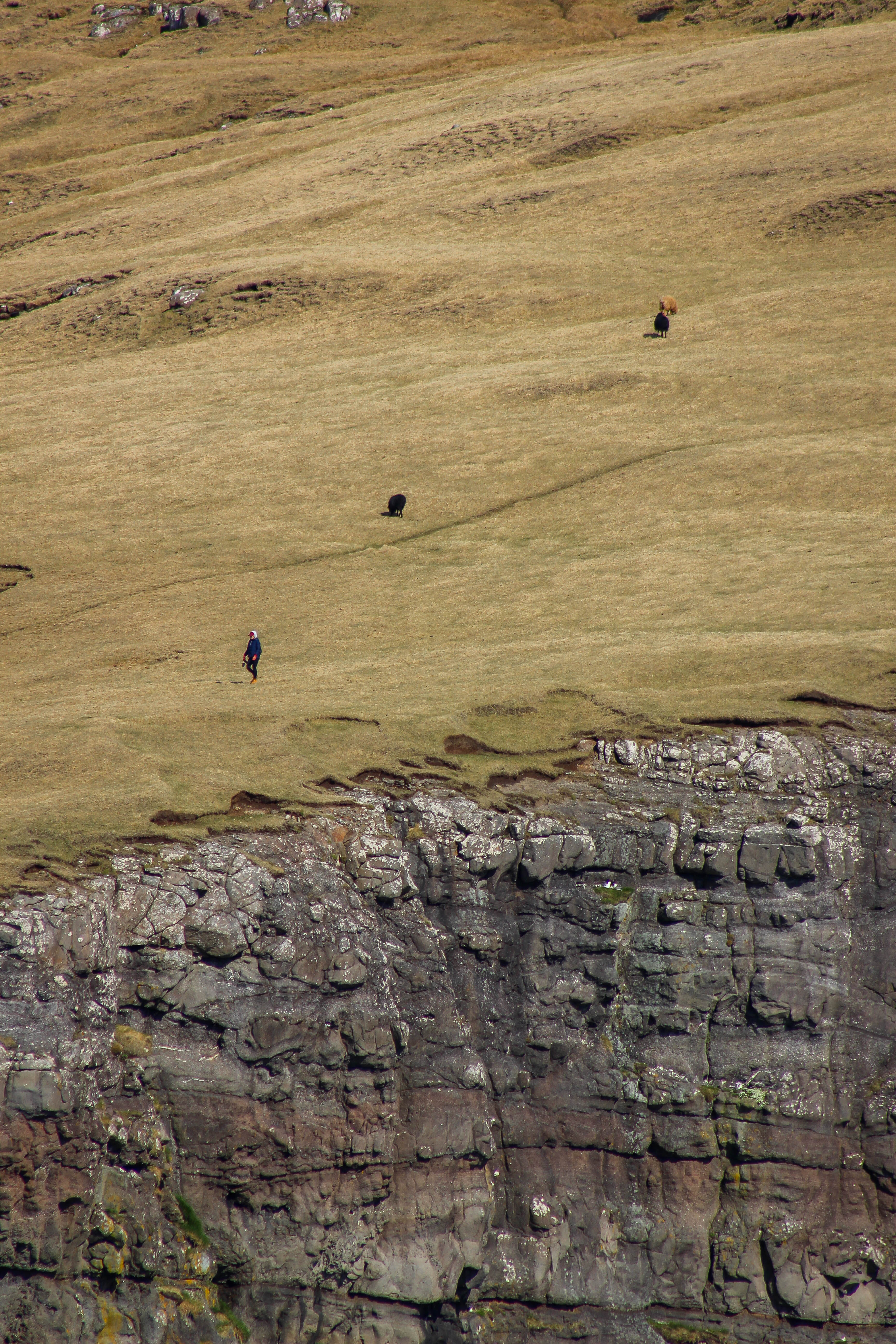 The Lake Sørvágsvatn hike out to Trælanípa cliffs and Bøsdalafossur waterfall | Faroe Islands | CompassAndTwine.com