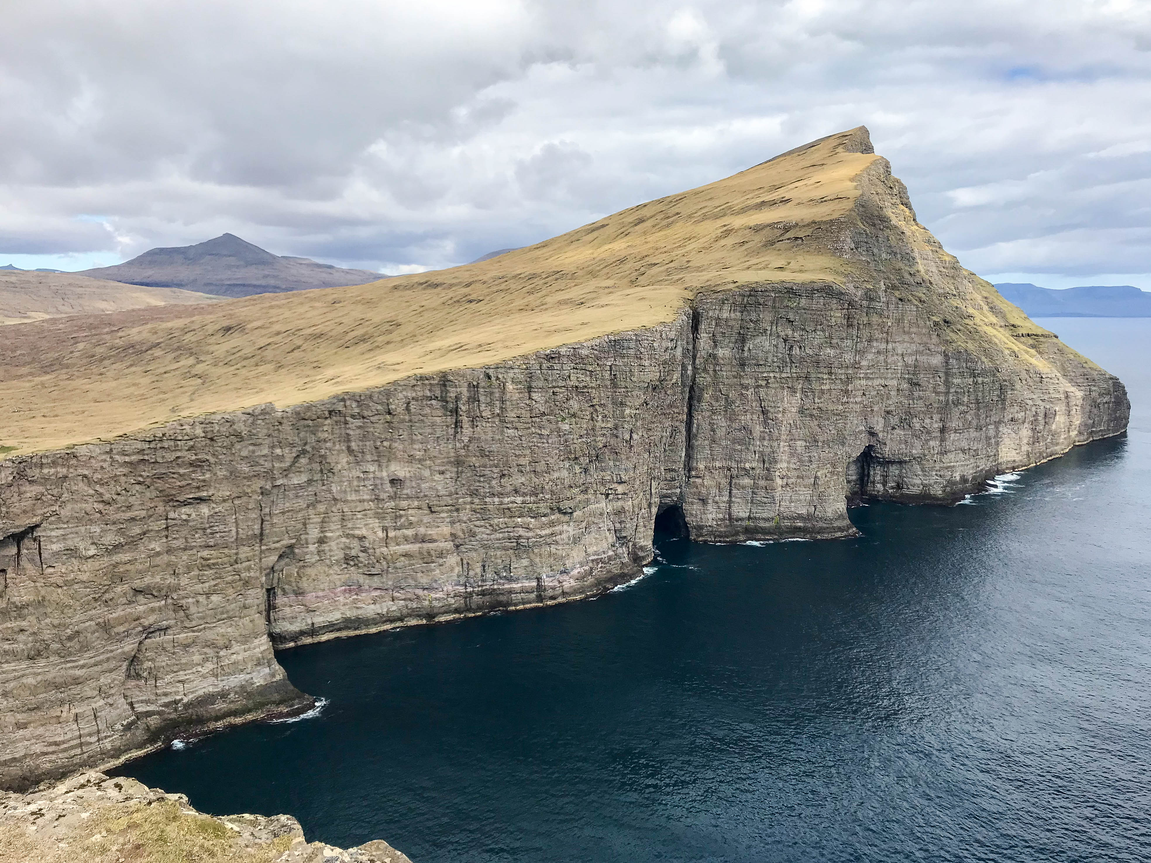 The Lake Sørvágsvatn hike out to Trælanípa cliffs and Bøsdalafossur waterfall | Faroe Islands | CompassAndTwine.com