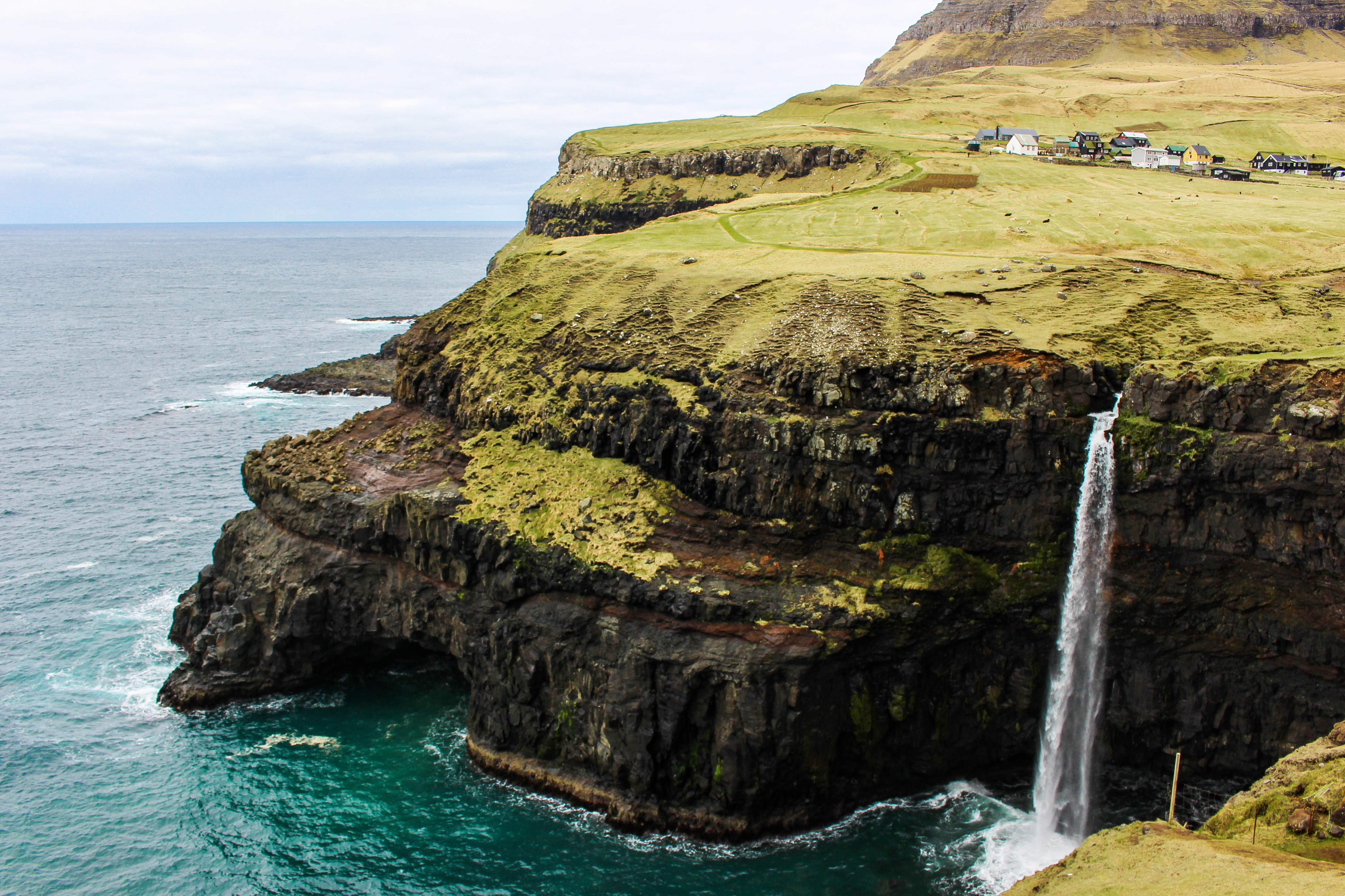 Visit the Fairytale Faroe Islands Waterfall: Múlafossur Waterfall in Gásadalur